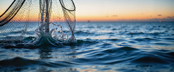 Fishing net being cast into ocean at dusk, tranquil capture of nature