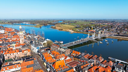 Obraz premium Aerial from the historical city Kampen at the river IJssel in the Netherlands
