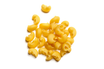 Top view of dry yellow pipe rigate pasta with ribbed, curved shapes loosely scattered on a clean white background, suitable for packaging or recipe visuals