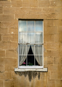 old window with curtins