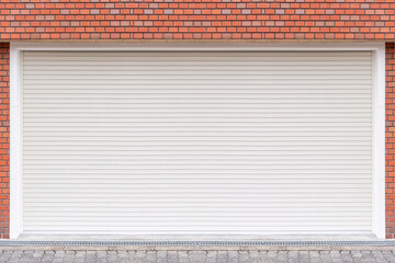 White closed steel shutter doors of warehouse, storage or storefront for metal door background and textured.