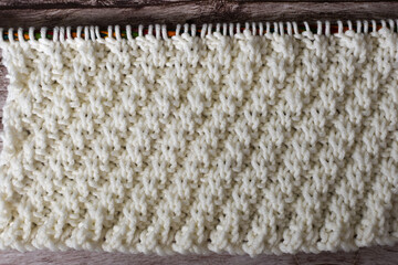 hand knitting stitch texture background white twisted rib stitch 