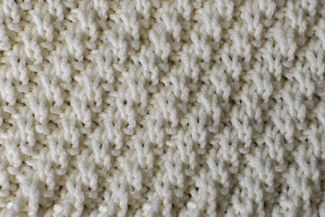 hand knitting stitch texture background white twisted rib stitch 