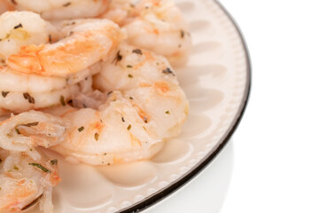Seafood salad, shrimp with garlic isolated on white background, macro.