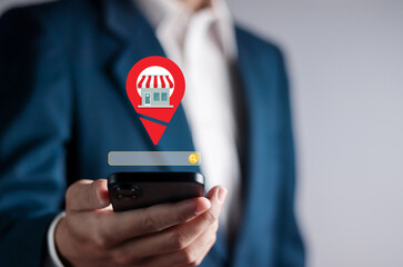 Local search marketing ecommerce concept. Local SEO strategy for small business. Businessman using...