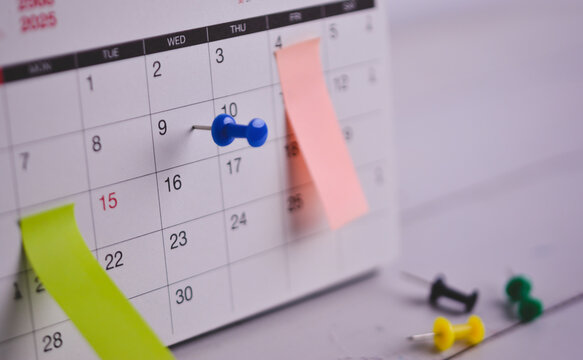 Close-up of calendar pin, Business meeting planning, Travel planning. Choose specific focus point