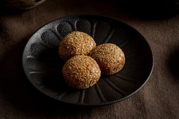 Sesame seed mochi are a traditional Japanese dessert.