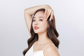 Obraz premium Beautiful young Asian woman model long hair with natural makeup on face clean fresh skin on isolated background. Cute girl portrait, Facial treatment, Body care, Beauty and Spa.