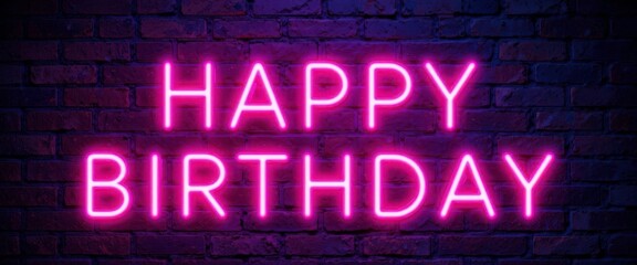 Obraz premium A Vibrant Birthday Message in Glowing Neon Letters Against a Dark Brick Wall