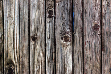Background of dark natural old boards. Close-up.
