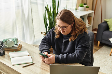 Young woman with Down syndrome enjoying a cozy afternoon at home while using her smartphone
