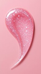 Swatch of a shiny, pink gloss with a pearlescent shimmer on a pink background