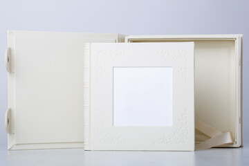 Wedding photobook with box in white leather binding. Wedding photo book  with mockup for engraving...