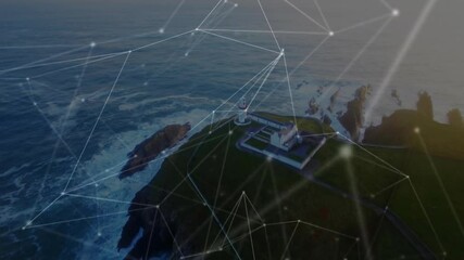 Coastal landscape with lighthouse overlayed by data processing network animation - Powered by Adobe