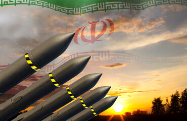 Missiles with Iran flag against the sunset. Bomb, chemical weapons, missile defense, a system of...