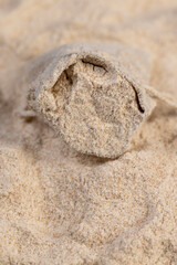 natural wholemeal wheat flour with bran in a linen bag