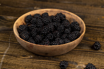 sour but ripe blackberries on the table