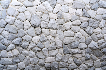 Part of a stone wall, gray color of background or texture, modern style design decoration.