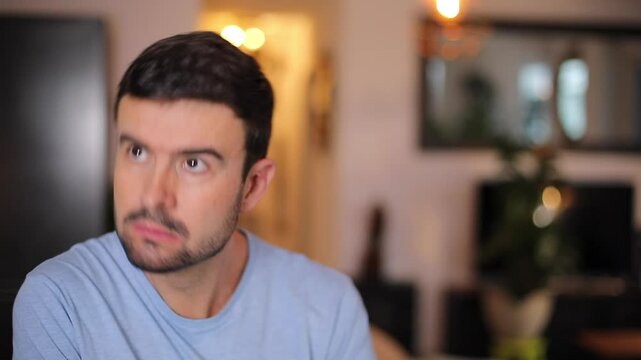 Man listening something weird around him 