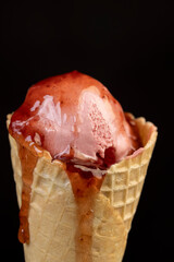 pink creamy raspberry flavored ice cream with red raspberry berries
