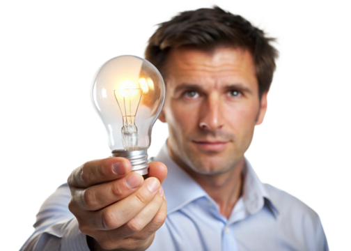 businessman holding light bulb