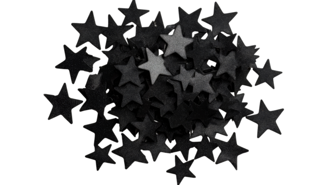 Pile of black star shaped confetti on black background, cut out transparent