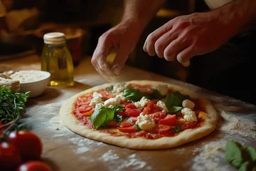 Fototapete Close-up of Pizzaiolo Handcrafting a Classic Margherita Pizza © Vitalii