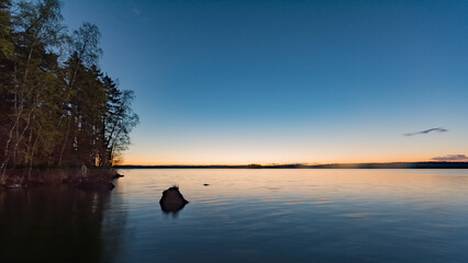 Early summer night by a lake in Finland