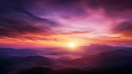 Fototapeta premium The sun setting over a vast mountain range, painting the sky with pinks, purples, and soft golds.