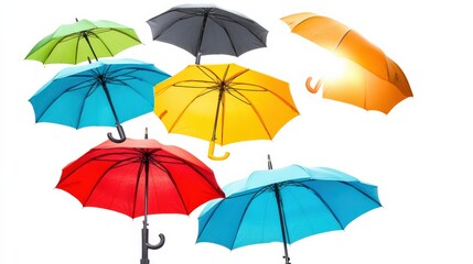 Obraz premium A Colorful Collection of Umbrellas Displayed Against a Bright White Background, Showcasing Various Shapes and Vibrant Shades for Artistic or Commercial Use