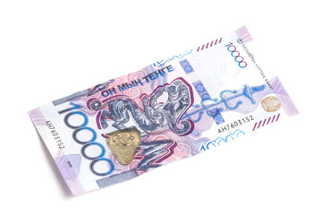 Ten thousand tenge banknote of Kazakhstan, highlighted on white background.