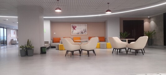 A well-designed corporate office blends functionality, style, and employee well-being. The layout typically includes open workspaces for collaboration, with adjustable desks and ergonomic furniture to