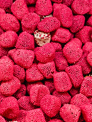 Red Raspberry Gummies with Tiny Sugar Beads Coated Sweet Treat Macro Photography Delicious Dessert Snack for Kids and Adults