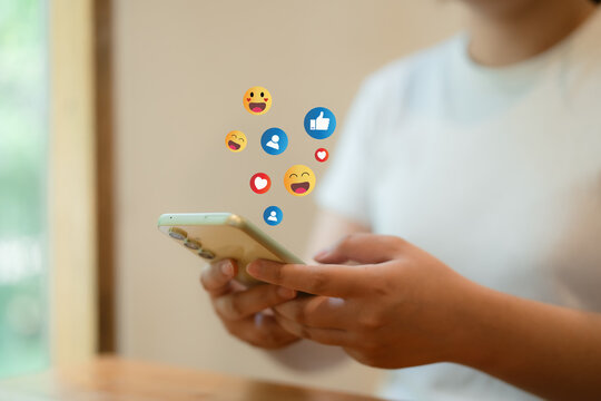 The concept of living on vacation and playing social media. Social media and digital online concept, man using smart phone with Social media. Social Distancing ,Working From Home concept..