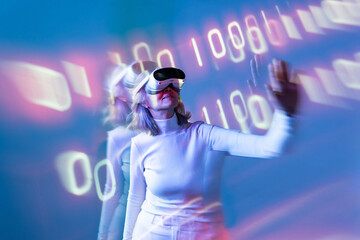 Elderly asian woman exploring virtual reality world