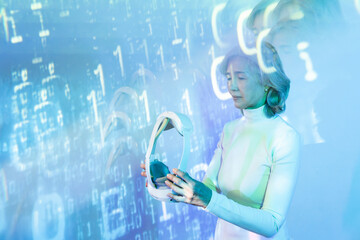 Elderly asian woman exploring the virtual metaverse