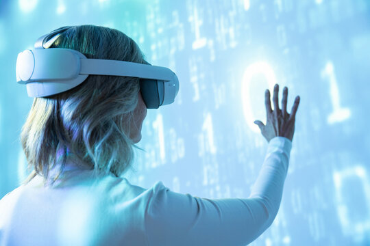 Elderly asian woman exploring virtual reality