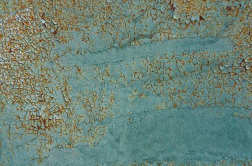 Captivating textures of weathered paint on a metallic surface showcasing intricate patterns of rust...