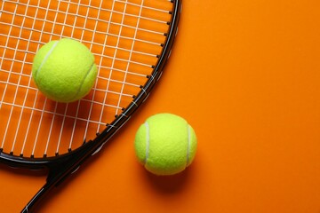 Tennis racket and balls on a color background