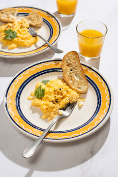Delicious Breakfast Setting with Scrambled Eggs and Toast