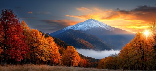 Fototapeta premium A breathtaking view of a majestic mountain at sunset, surrounded by vibrant autumn foliage