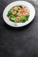 Shrimp salad seafood vegetables dish fresh delicious gourmet food background on table rustic food top view copy space keto and paleo diet vegetarian food pescetarian diet