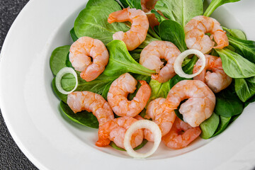 Shrimp salad seafood vegetables dish fresh delicious gourmet food background on table rustic food top view copy space keto and paleo diet vegetarian food pescetarian diet
