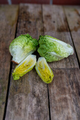 Raw organic Belgian endive ready to use on wooden table