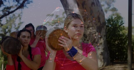 Carrying logs outdoors, women with data network animation overlay in forest - Powered by Adobe