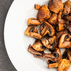 Mushrooms fried champignons vegetables dish fresh gourmet food background on the table rustic food top view copy space food