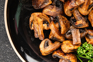 Mushrooms fried champignons vegetables dish fresh gourmet food background on the table rustic food top view copy space food