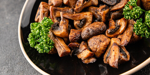 Mushrooms fried champignons vegetables dish fresh gourmet food background on the table rustic food top view copy space food