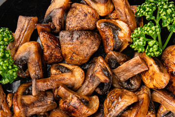 Mushrooms fried champignons vegetables dish fresh gourmet food background on the table rustic food top view copy space food
