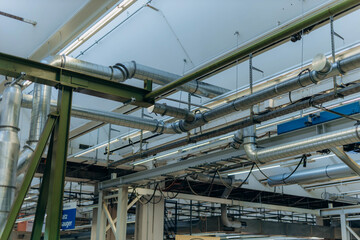 Overhead crane or bridge crane consists of parallel runways with a bridge between column also include hoist lifting and rope. Machinery for manufacturing or transportation in factory or warehouse.